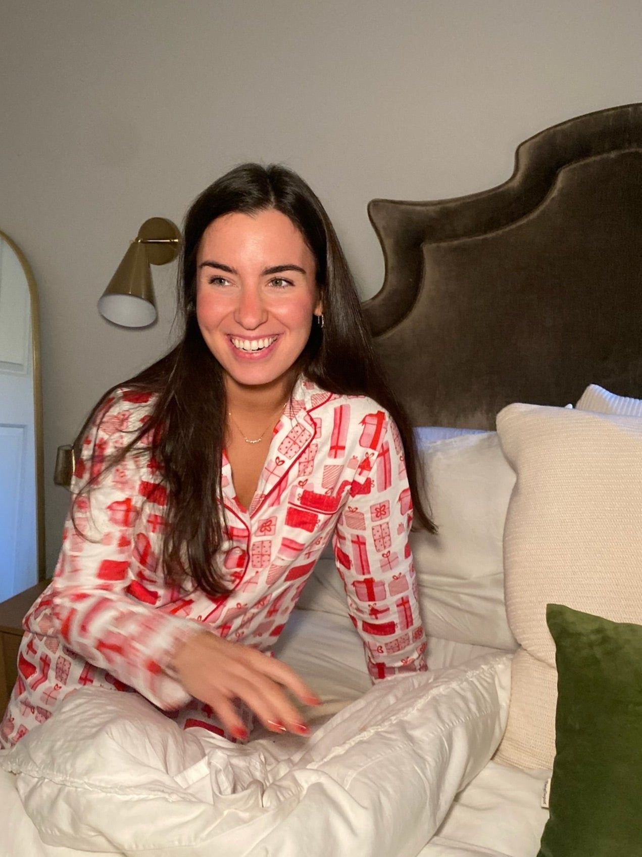 A cozy 100% cotton pajama set featuring a festive design of red watercolor Christmas gifts, perfect for holiday relaxation exclusively created by Gigi Mager. 1